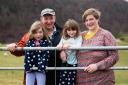 Peter Junor with partner Jennifer and daughters Megan and Marie  Ref:RH150324034  Rob Haining / The Scottish Farmer...