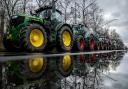 Farmers park their tractors at the government district in Berlin (AP)