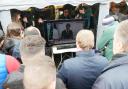Farmers watch as French prime minister Gabriel Attal announces new measures