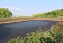 An earth-banked slurry lagoon is one example of several different types of slurry stores as we explore pros and cons