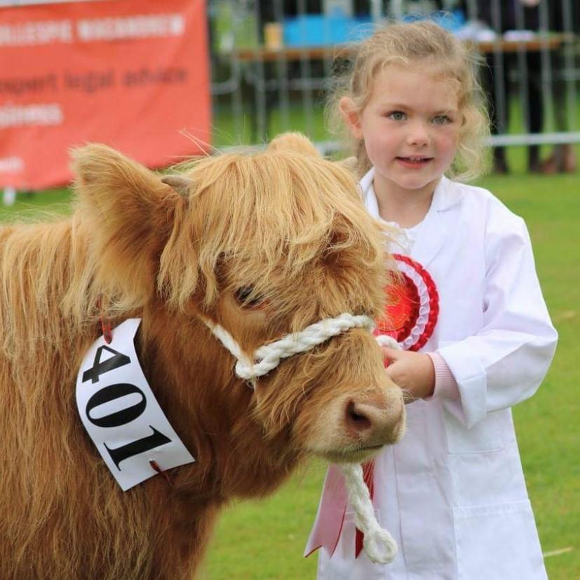 Catherine McKechnie - Esmi Doherty  age 4. grandaughter of Jim and Catherine McKechnie  Farm Gartocharn first time showing and very proud of her 1st prize Highland Calf