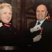 John being finally presented with his MBE by the Lord Lieutenant for Orkney, Elaine Grieve