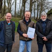 Presenting the consultation on Cattle Identification and Traceability in Scotland - Left to Right: MSP Jim Fairlie, farmer Robert Neill, NFUS president Martin Kennedy