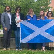 Caroline Millar, Scottish Agritourism Sector Lead and Laura Paterson, Scottish Agritourism Head of Stakeholder & Brand Engagement with international agritourism colleagues following the announcement of Scotland's winning bid