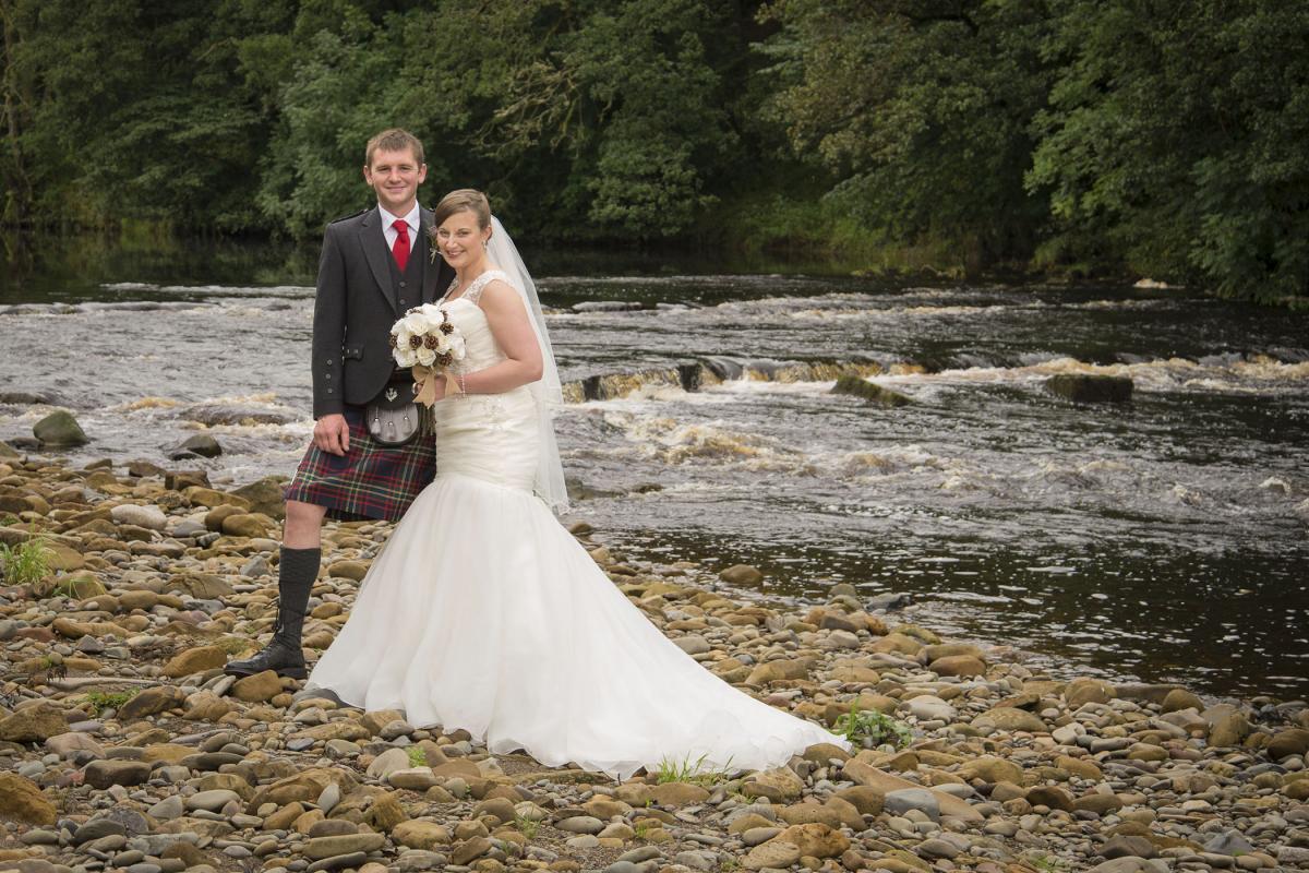 Chelsea O'Reilly and Gordon Nichol of Lawston Farm, Newcastleton, were married at home at the river side, with the reception being held in their cow shed!