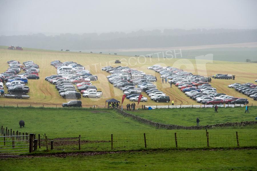 Cars were parked in the silage field. Ref: RH8617299