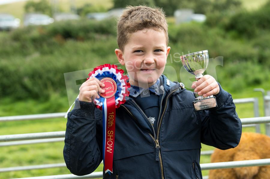 Six year old Mac Gilchrist won the young handlers at Abington show. Ref: RH19817604.
