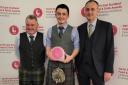 Fraser Chapman centre won Rising Star award pictured with Alan Hutcheon chairman of the Institute of Auctioneers and Appraisers in Scotland, left, and John Angus head of livestock at ANM
