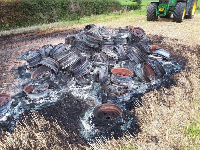 THESE TYRES were flytipped onto farmland near Hurlford - then set alight