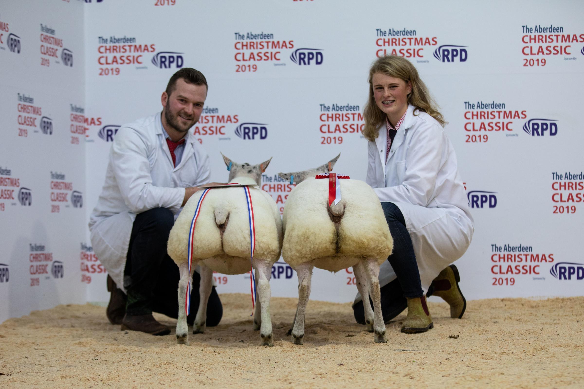 Rory Gregor with his pair of 51.5kg champion young farmers lambs at the 2019 event Ref:EC2511192433