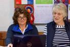 Debbie and Judy McGowan hard at it watching the bids fly in for the business' Working Genes on-line sale