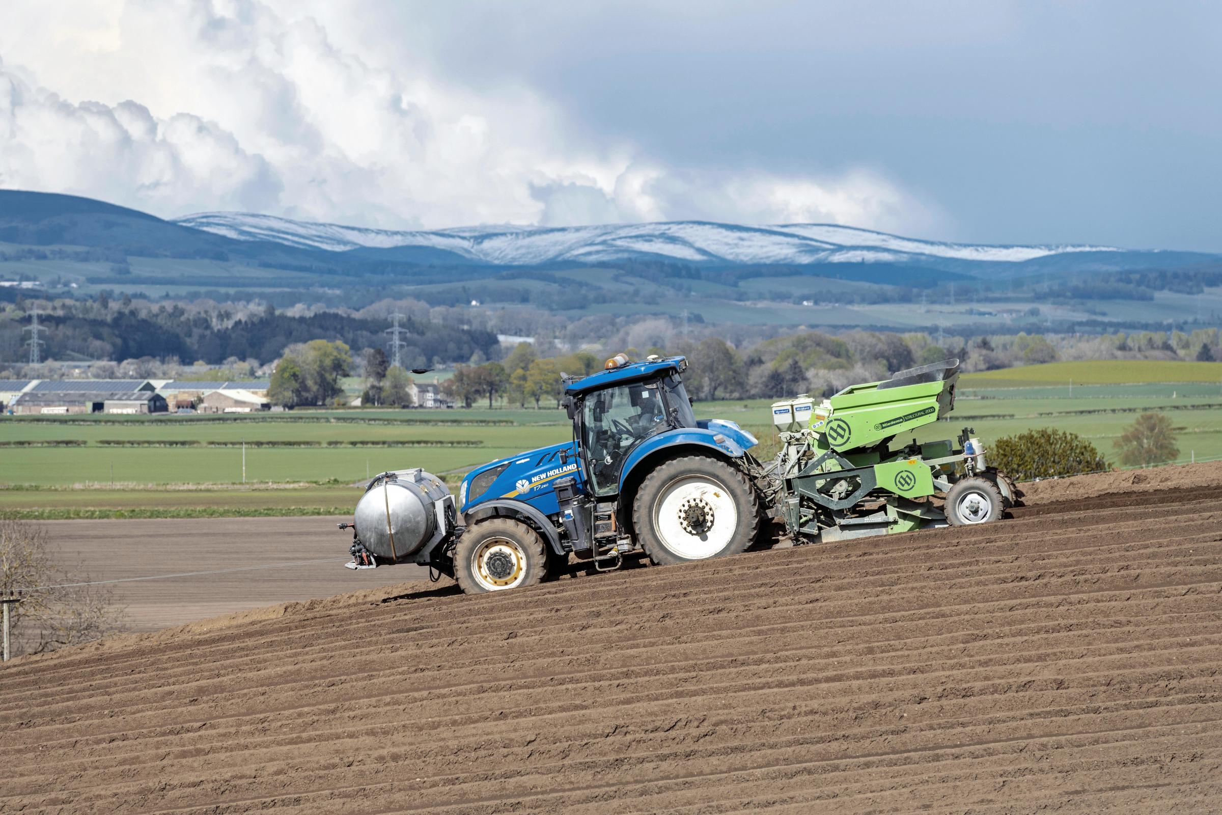Pictured at Denhead Farms, Coupar Angus, Perthshire, planting potatoes with Miedema Structural 2000 belt planter - certainly a tractor driver with a view!