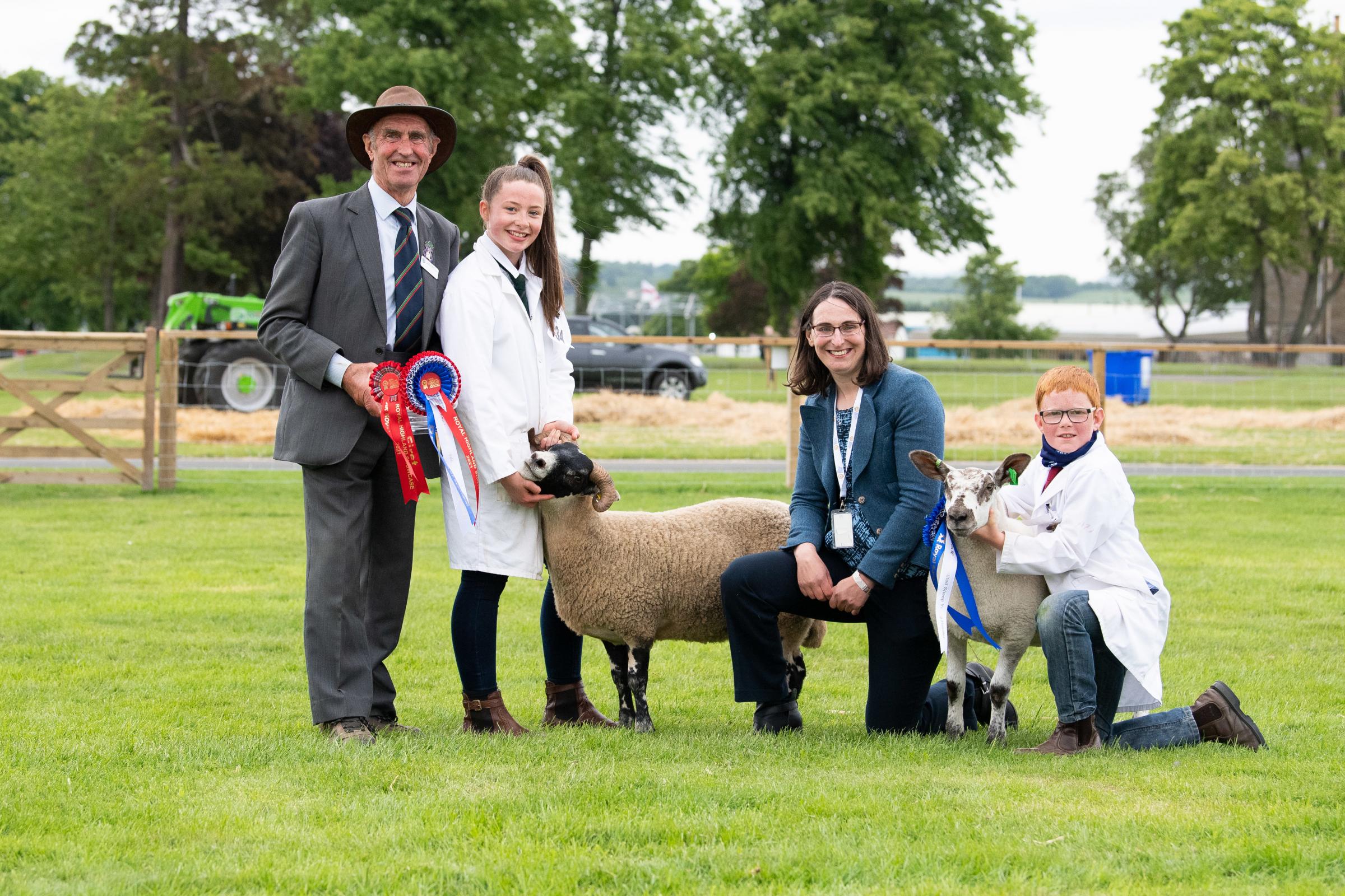 Joanna Dale won overall young handler and reserve went to Alexander Clark, pictured with former RHASS chairman Jimmy Warnock and the judge, his daughter Carol Anne Warnock Ref:RH150621083