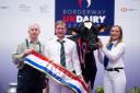 Grand champion was the Laird family's Holstein, Mag Pandor pictured from left with Alister Laird, son Colin and his wife Izzy