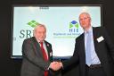 Professor Wayne Powell and Stuart Black celebrate a new collaboration between SRUC and HIE
