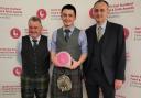 Fraser Chapman centre won Rising Star award pictured with Alan Hutcheon chairman of the Institute of Auctioneers and Appraisers in Scotland, left, and John Angus head of livestock at ANM
