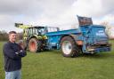 Michael Rutherwford with his Bunning muck spreader, with a Claas at the front