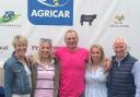 Alan pictured with the late Lorna's brother, Robert (right) and his family from left Lynn, Amy and Rebecca as he sets off from her home farm, Chalmerston