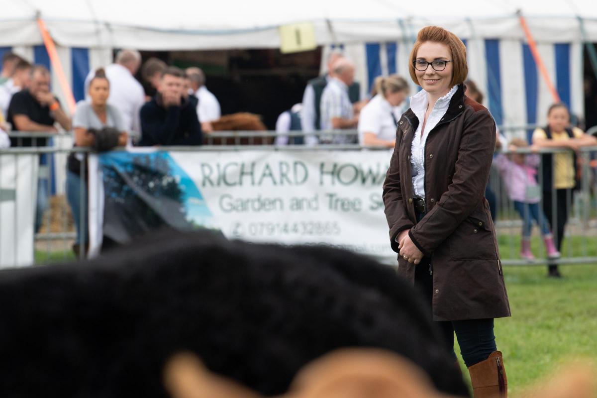 Jennifer Hyslop casting her eye over the entry in the Commercial beef section  Ref:RH090921056  Rob Haining / The Scottish Farmer...