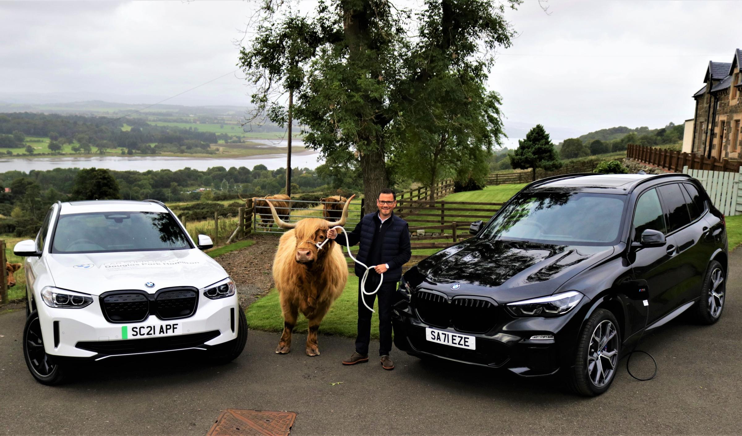 Highland cows and green cars are now playing a major role in a change of direction for one farm holiday accommodation business overlooking the River Clyde