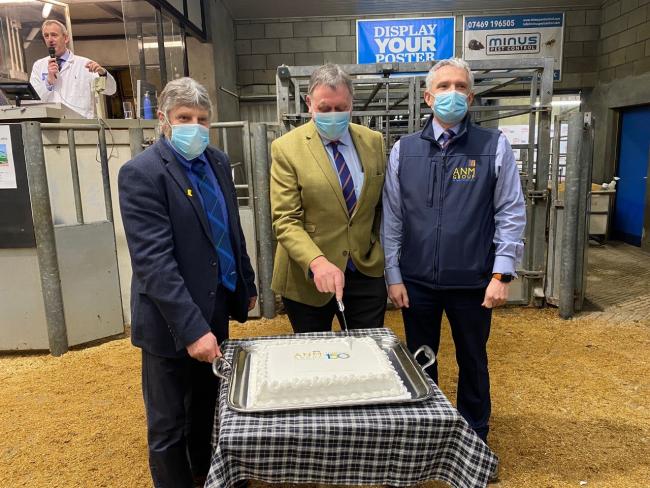 Martin Kennedy, NFUS president ; Pete Watson, chairman of ANM Group and Grant Rogerson, chief executive ANM cut the cake celebrating 150 years of the ANM Group
