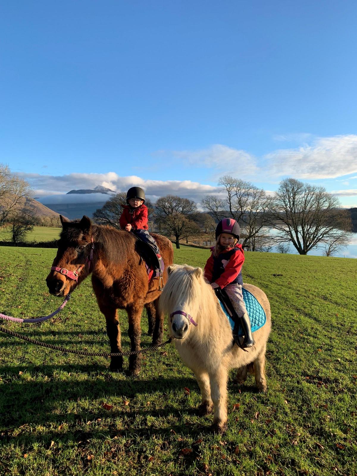 Mammie Carswell - Cora and Archie enjoying a bit of west coast sunshine, with Ben Cruachan in the background.