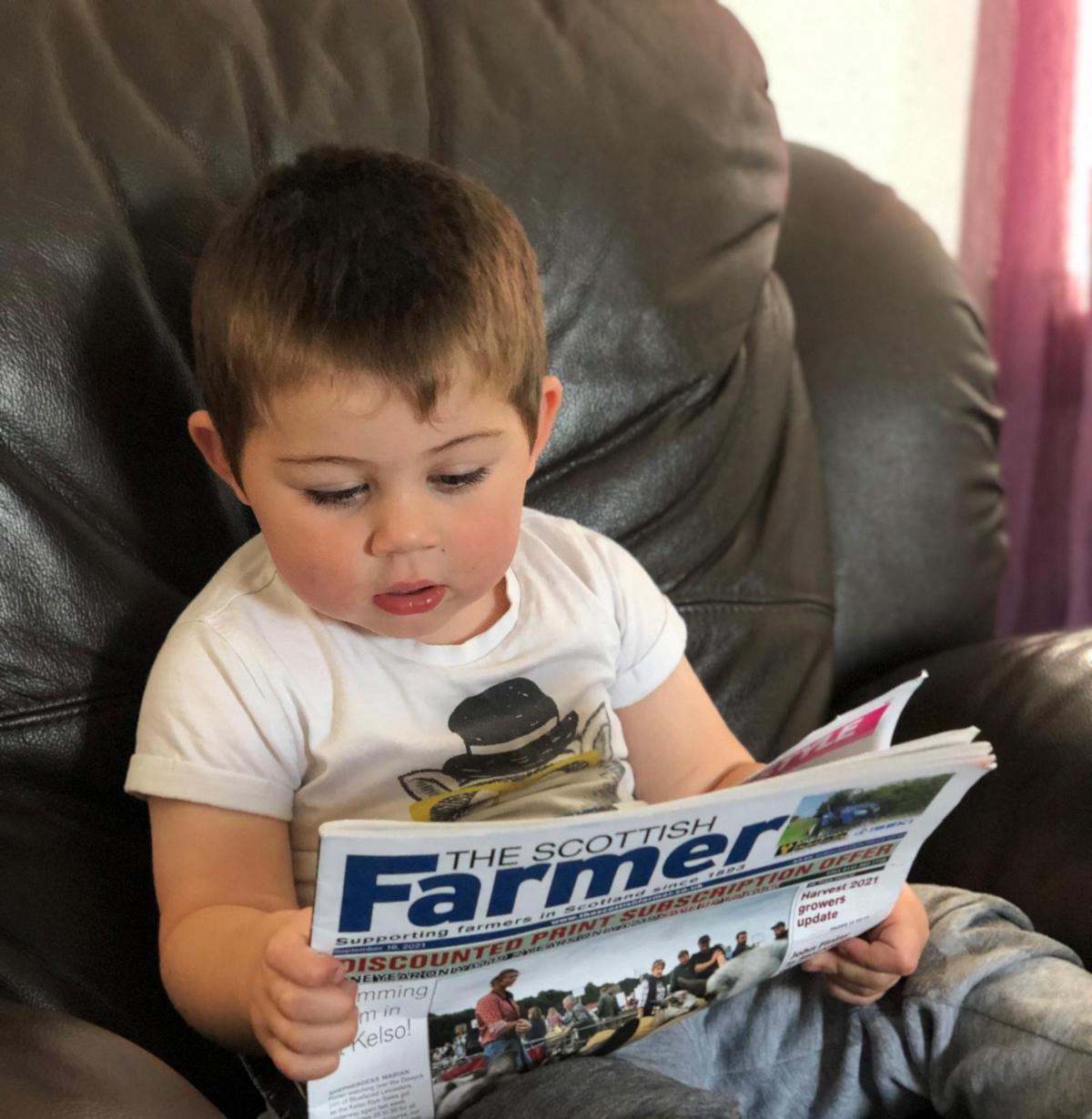 Nicole Murray - Young Jim picking out his first tractor