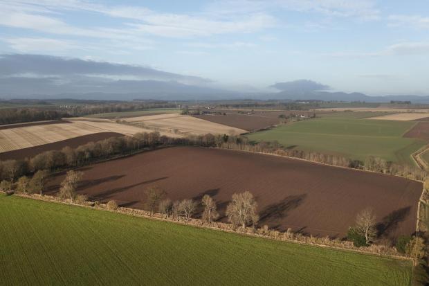 An aerial view of the three farm Angus arable enterprise that is up for sale