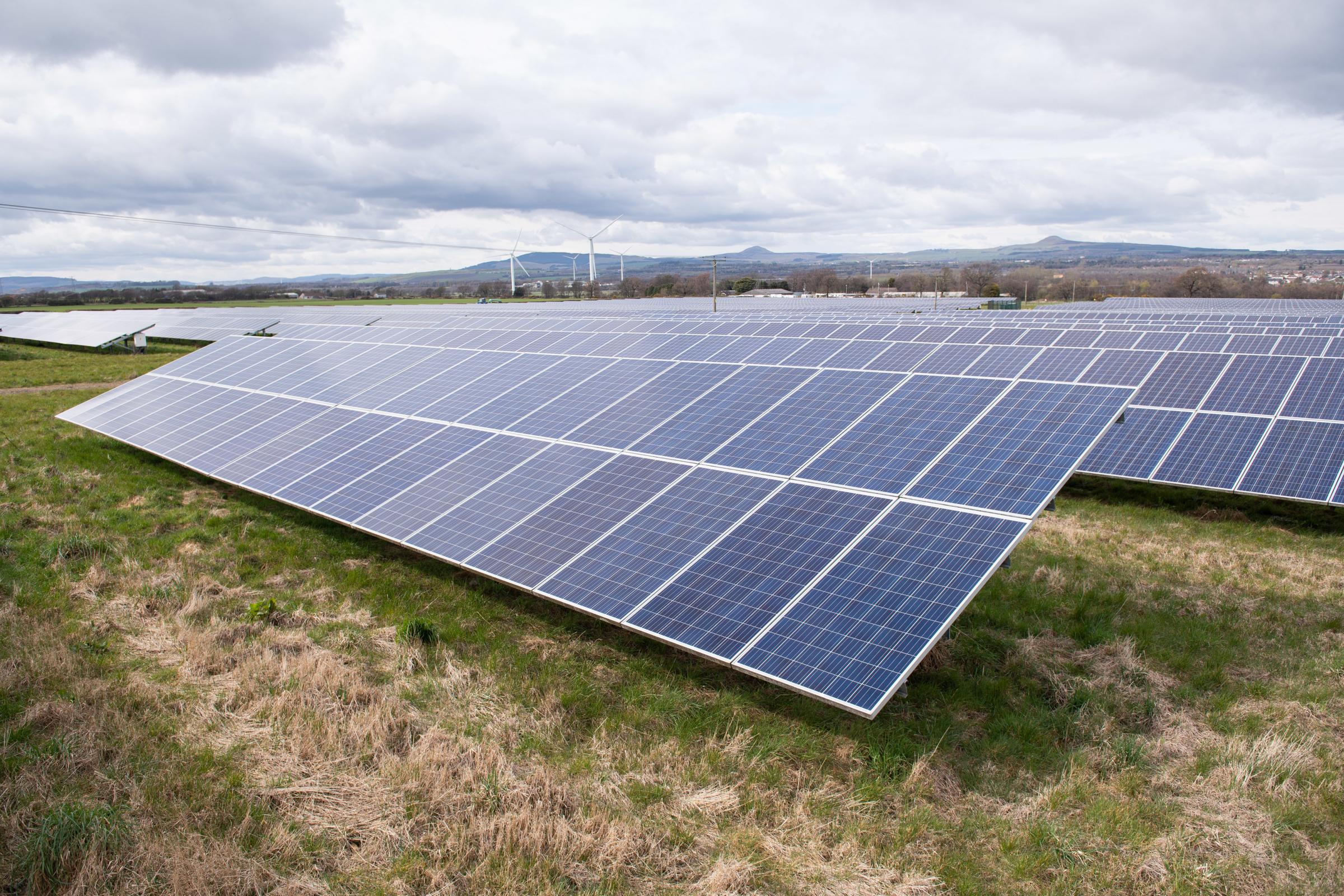 Modern ground-mounted solar arrays work perfectly well on a dull Scottish spring day Ref:RH070422023 Rob Haining / The Scottish Farmer