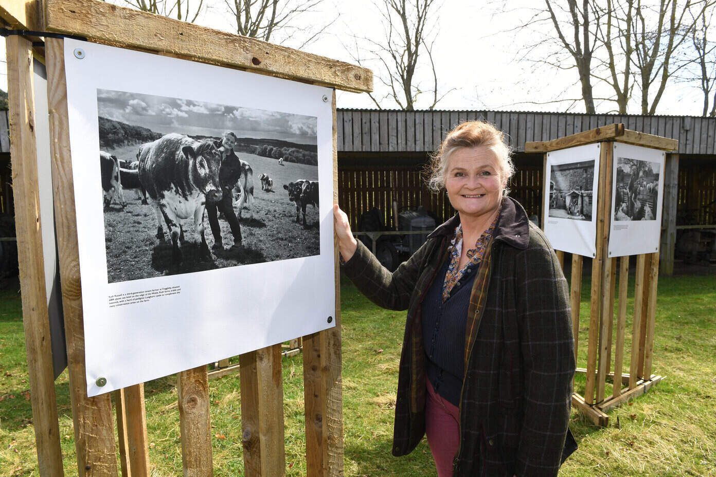 Farmer Ruth Russell alongside her photograph captured by Lucy Saggers for the All in a days work exhibition at Ryedale Folk Museum Credit Gerard Binks