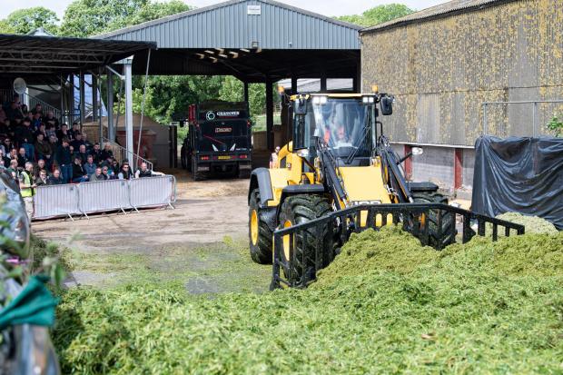 The Scottish Farmer: JCB 435s has a Stage V Cummins 6.7-litre engine, so has plenty of power to move grass about the clamp Ref:RH180522241 Rob Haining / The Scottish Farmer...