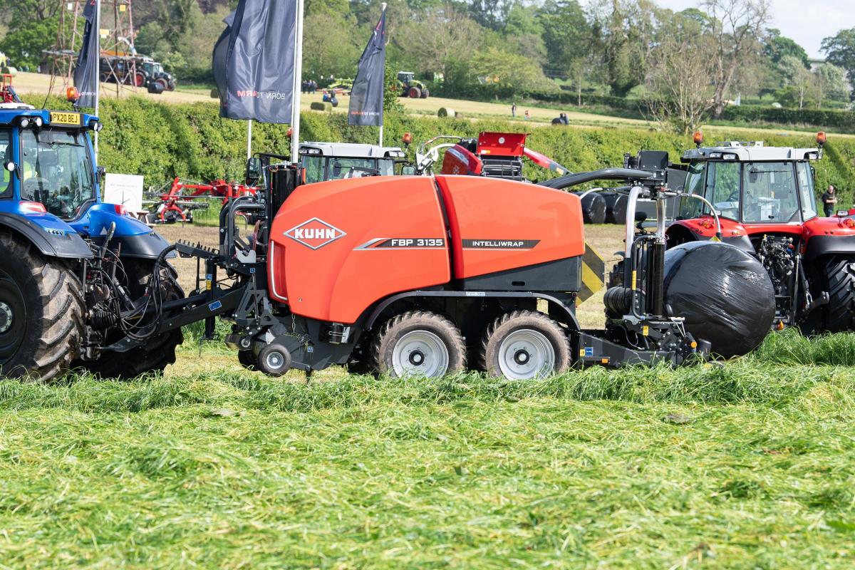 Kuhn FBP 3135 baler-wrapper combination making light work baling and wrapping the grass during the demo  Ref:RH180522261  Rob Haining / The Scottish Farmer...