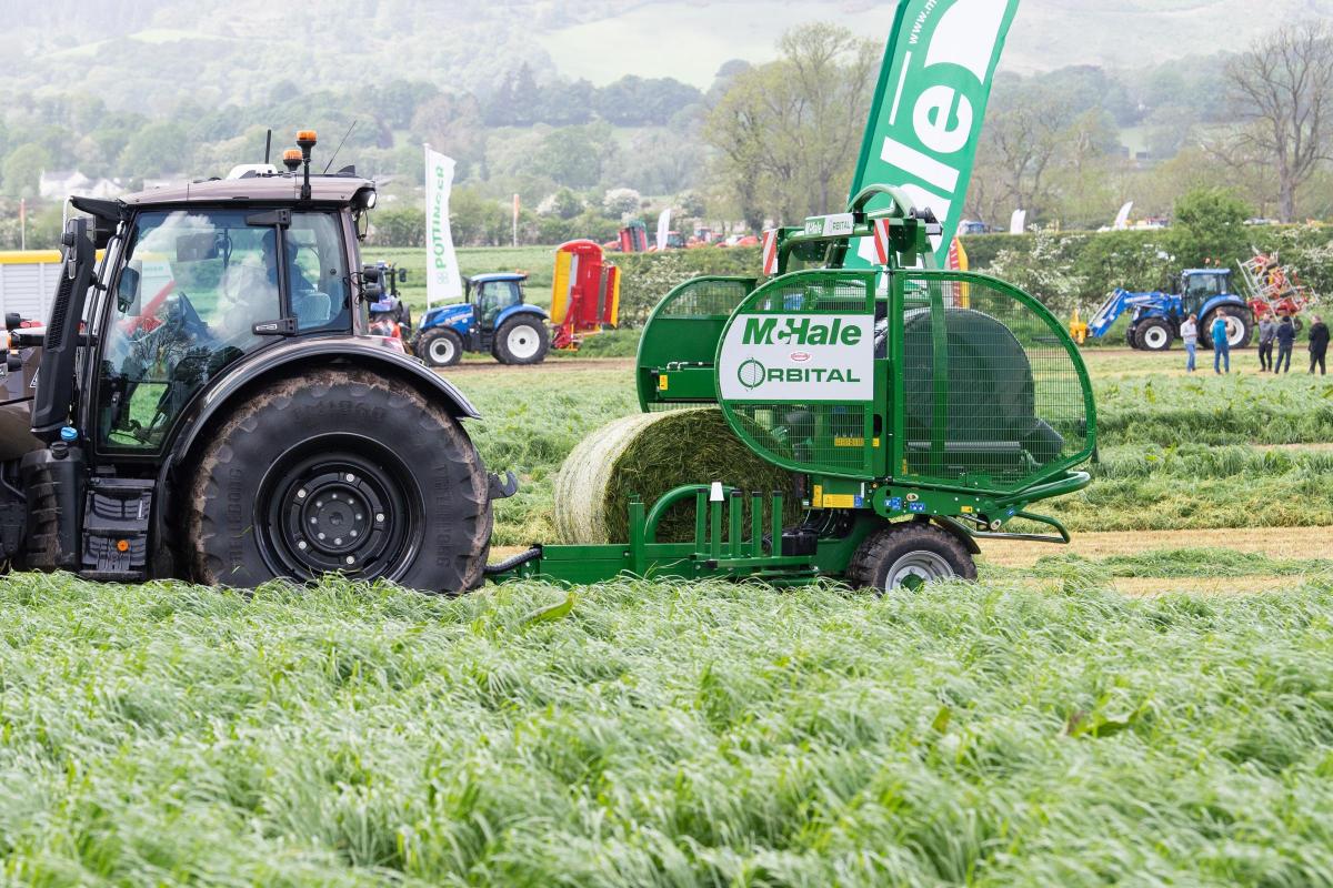McHale Orbital trailed bale wrapper, lifing bales in the field to wrap them and using wrapping technology used in the Fusion system from Mchale Ref:RH180522233  Rob Haining / The Scottish Farmer...