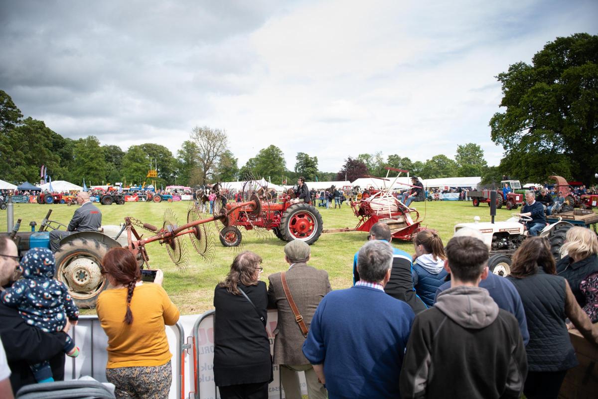 Spectators gather round the main ring at Fife show for the display of vintage horse drawn equipment and tractors  Ref:RH210522374  Rob Haining / The Scottish Farmer...