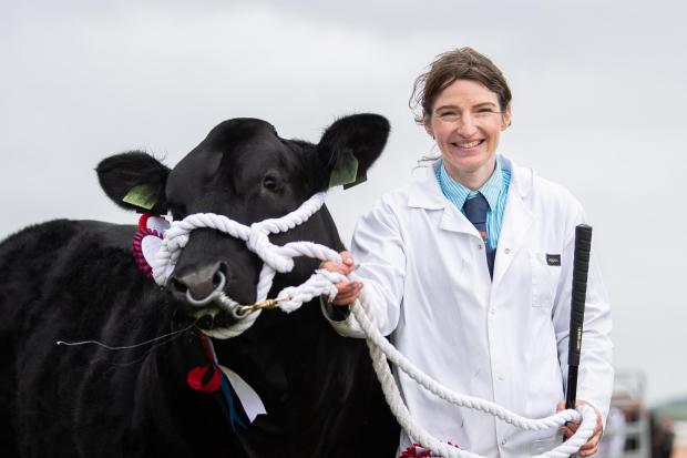 The Scottish Farmer:  Lynsey Bett and her Commercial champion Sexy Spice , after winning the overall cattle championship at Stirling Show Ref:RH110622203 Rob Haining / The Scottish Farmer...