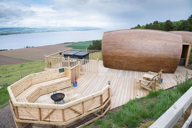 The Scottish Farmer: Situated on the hillside above the farm, the pods command a excellent view over the river Tay and the hills beyond Ref:RH300522060 Rob Haining / The Scottish Farmer...