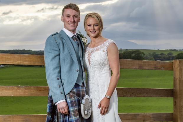 It’s a happy first wedding anniversary to William and Aileen McJannet – and a belated wedding picture in our Wedding Album for the couple who were married in June, 2021, at Brockelhill Farm, Ayr