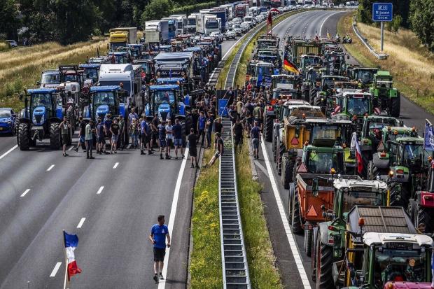 Farm vehicles stopping traffic near the border of the Netherlands and Germany (Pic: VINCENT JANNINK/ANP/AFP via Getty Images)