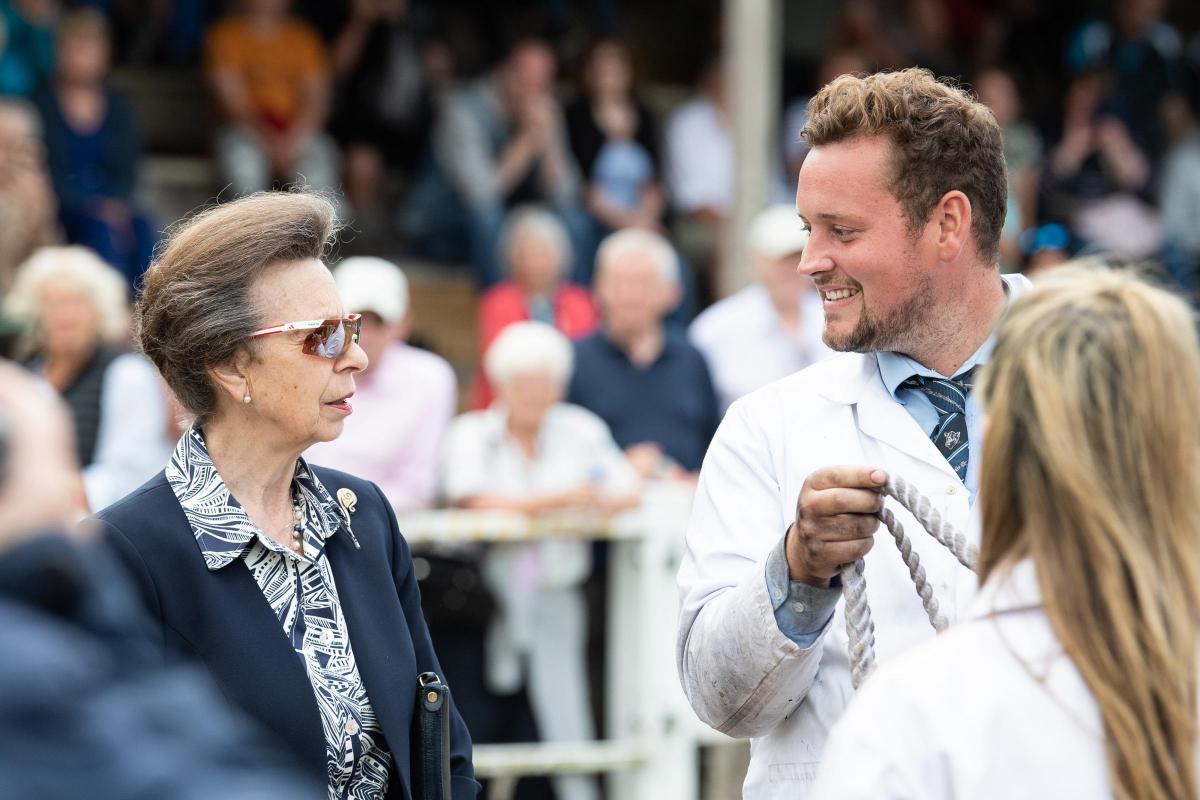 All smiles for Mark Wattie as he chats to HRH The Princess Royal in the champion of champions  line up at Turriff show Ref:RH010822054  Rob Haining / The Scottish Farmer...