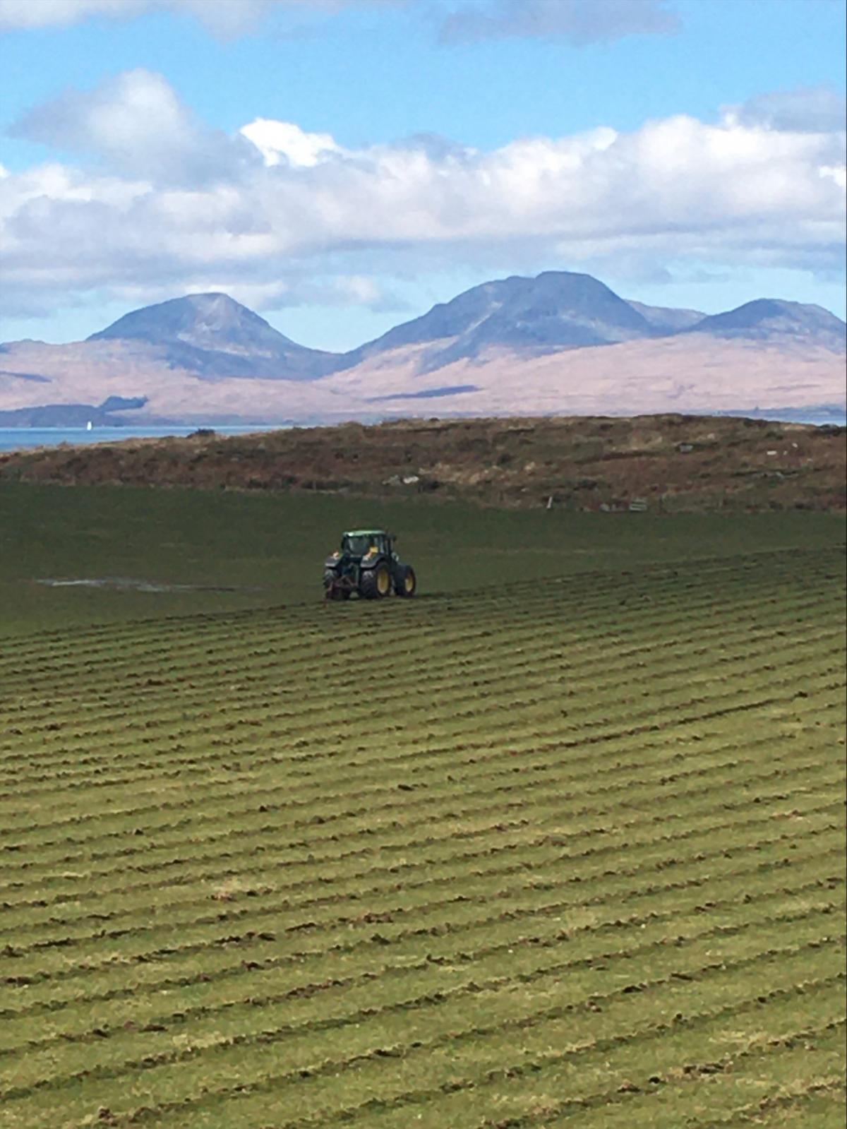 James Peterson - Donald MacNicol subsoiling, with the paps of Jura in the background