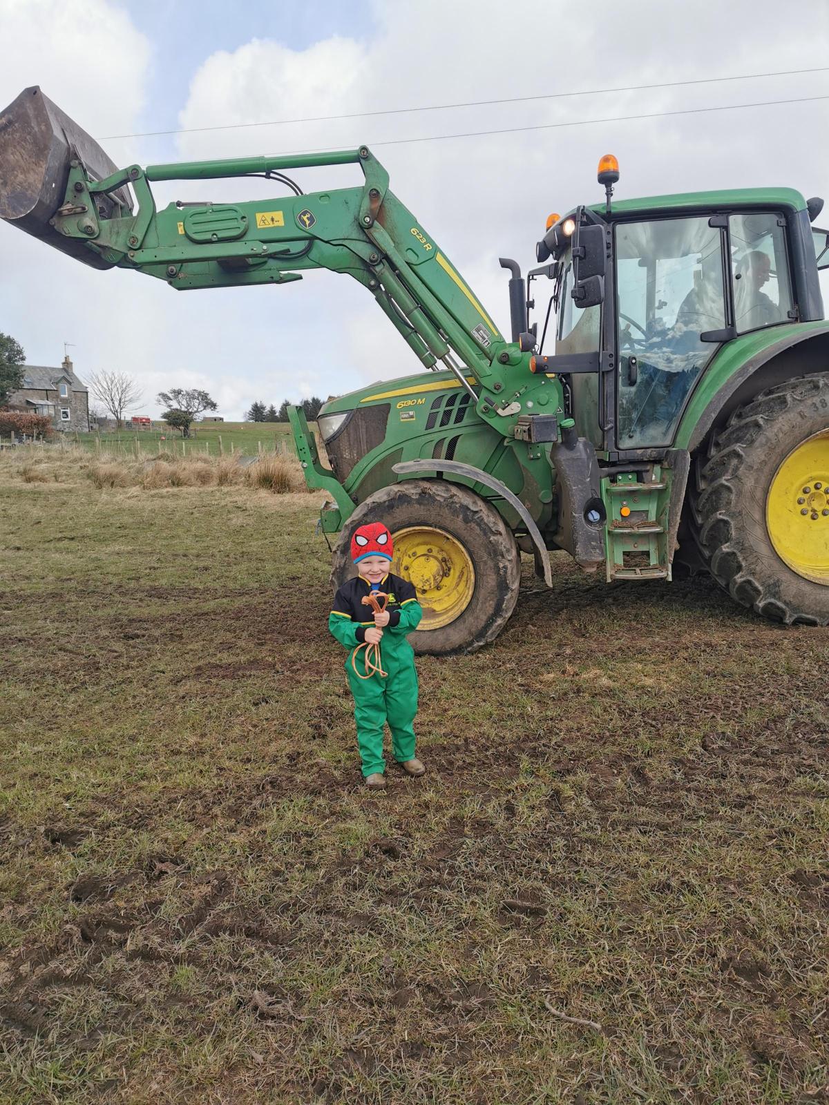 Keri Milne - My 4 year old Cameron with the 'can fix anything bailer twine