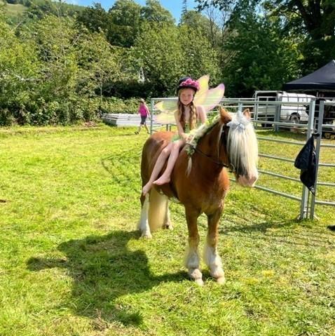 Catriona Duncan - Kirsty laurie 8 years old on Goldie at strontain show looking sparkly as a woodland fairy