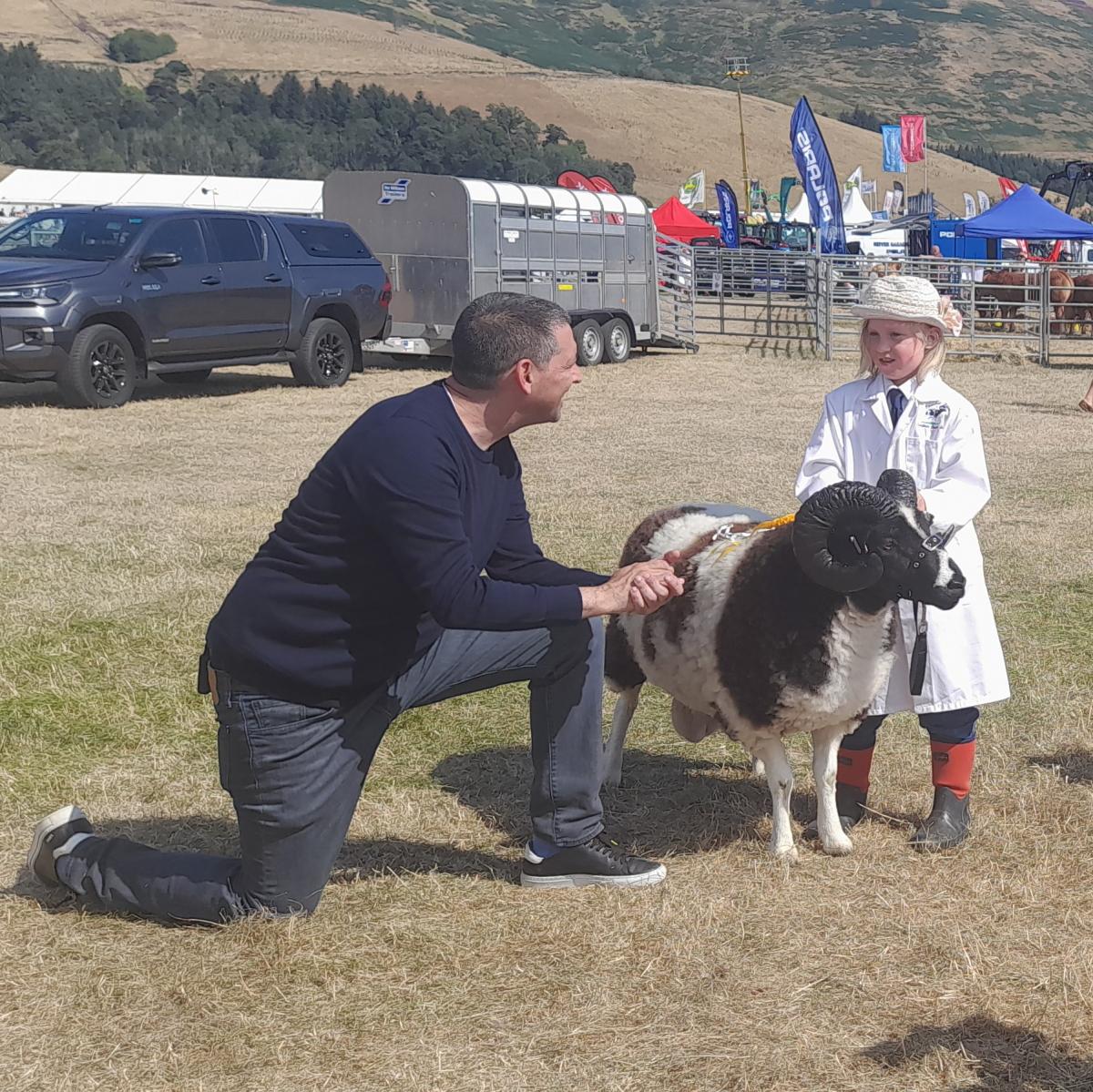 Tamsin James (Kingshill Farm) - Here's 9 year old Enid James who was showing her Jacob tup, Enidrae Christopher at Peebles Show last year.
