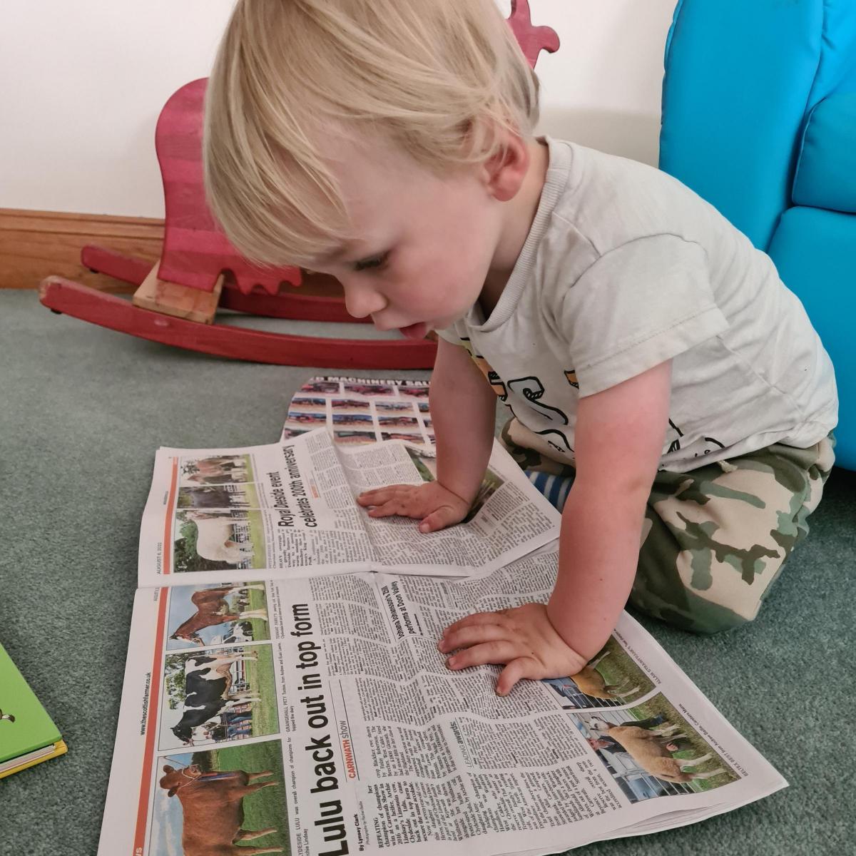 Hannah Pedgrift - Freddie Brown, 1 year old catching up on the news