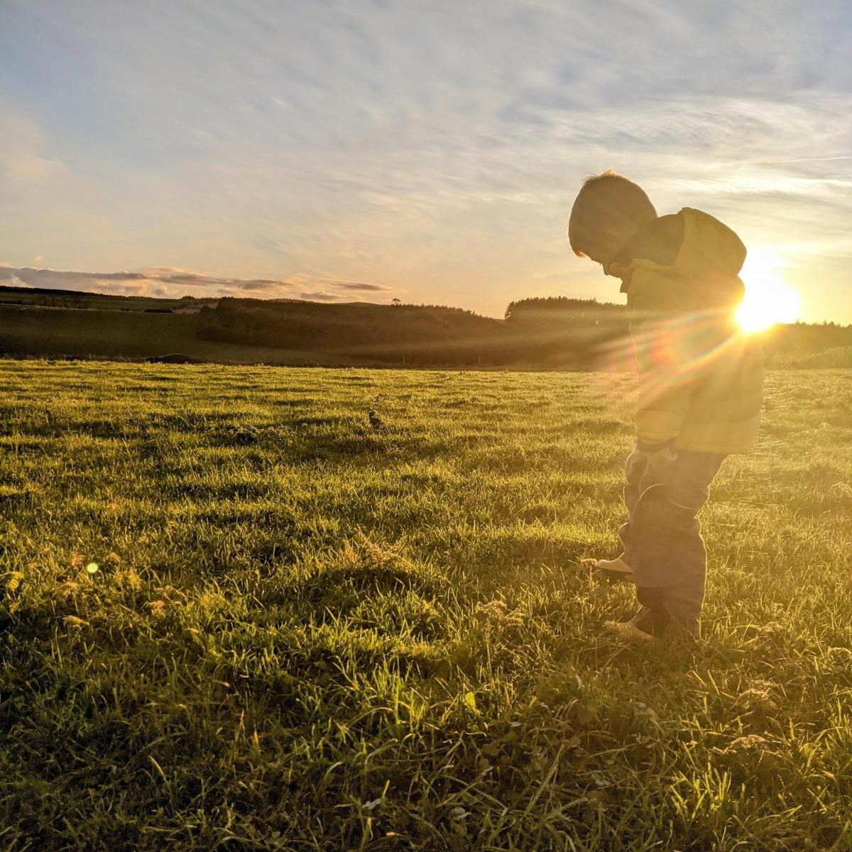 Amy Ross-Henderson - Joshua walking the fields at his Grandfather's farm in the beautiful autumnal light