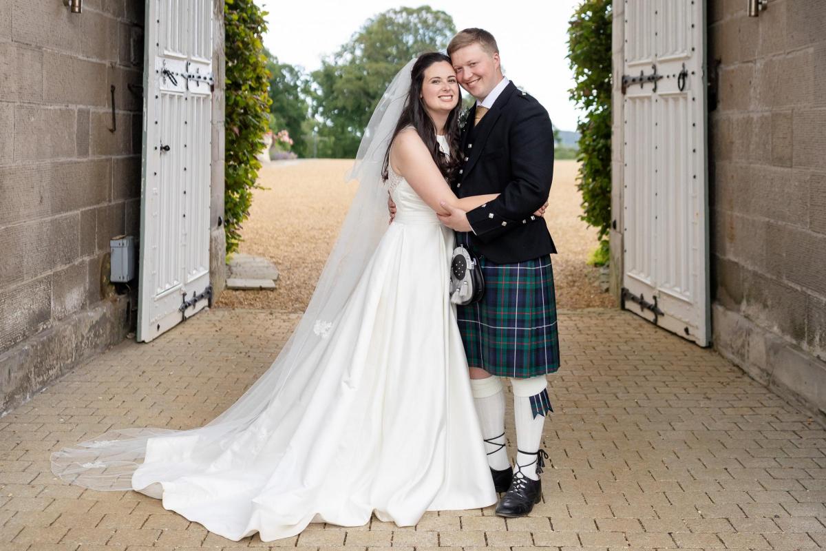 A magical union! Laura Brown and Gavin Robertson became Mr. and Mrs. on July 21, 2023, surrounded by the historic beauty of Dundas Castle (Image: Imagine Images)