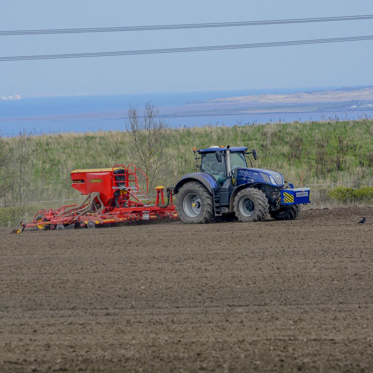 Ross Lyall - Looking over the forth with a beautiful T7.315 and 6 metre Vaderstad drill