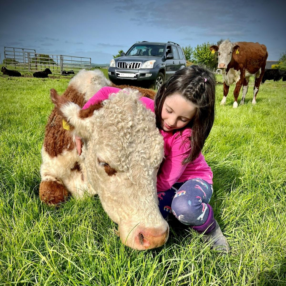 Amanda Reid - Zoe Ellis age 7. Blair Farm Chapel of Garioch, Inverurie. Zoe with one of her many friends.