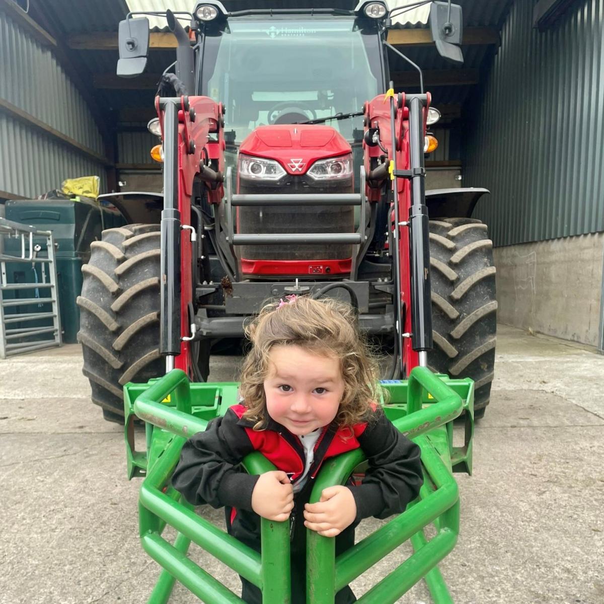 Rachel Hyslop - Finally getting first cut haylage finished nearly two months after it started. 2 year old Hannah helping at towncroft farm. Picture by my husband Alistair Young.
