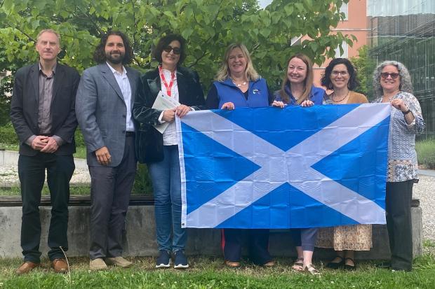 Caroline Millar, Scottish Agritourism Sector Lead and Laura Paterson, Scottish Agritourism Head of Stakeholder & Brand Engagement with international agritourism colleagues following the announcement of Scotland's winning bid at the World